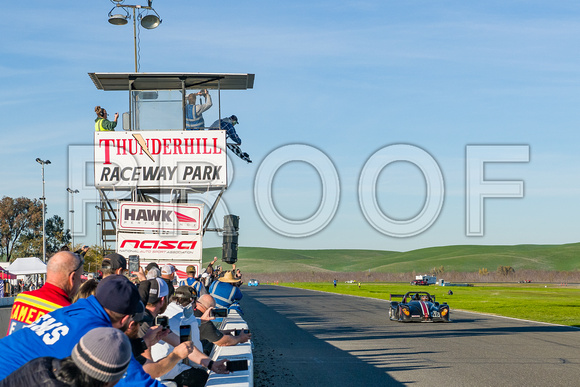 Image of race cars taking the checkered flag for the 2021 NASA 25 Hours of Thunderhill at Thunderhill Raceway Park in Willows California.  NASA 25 Hours Race, National Auto Sports Association, NorCal