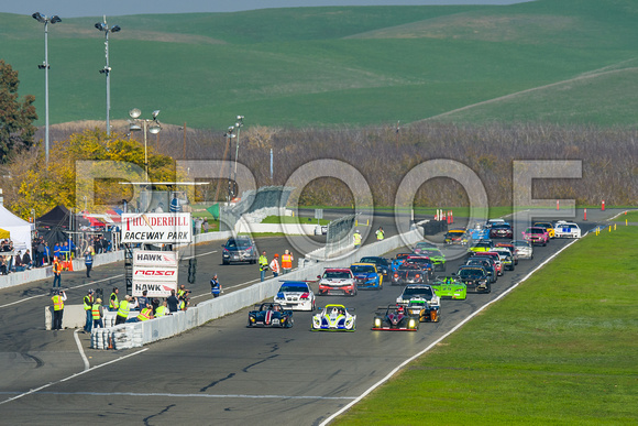 Image of race cars taking the green flag for the 2021 NASA 25 Hours of Thunderhill at Thunderhill Raceway Park in Willows California.  NASA 25 Hours Race, National Auto Sports Association, NorCal Regi