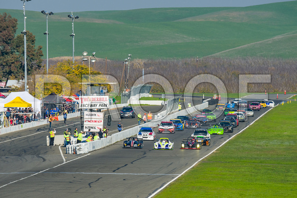 Image of race cars taking the green flag for the 2021 NASA 25 Hours of Thunderhill at Thunderhill Raceway Park in Willows California.  NASA 25 Hours Race, National Auto Sports Association, NorCal Regi