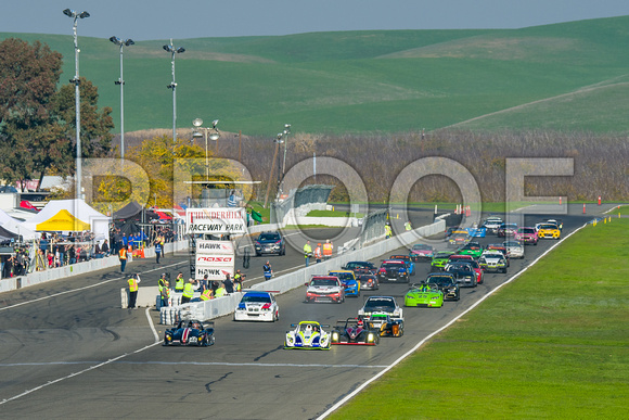 Image of race cars taking the green flag for the 2021 NASA 25 Hours of Thunderhill at Thunderhill Raceway Park in Willows California.  NASA 25 Hours Race, National Auto Sports Association, NorCal Regi