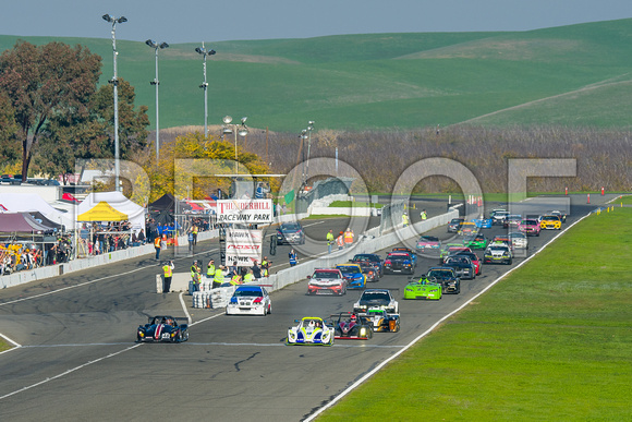 Image of race cars taking the green flag for the 2021 NASA 25 Hours of Thunderhill at Thunderhill Raceway Park in Willows California.  NASA 25 Hours Race, National Auto Sports Association, NorCal Regi